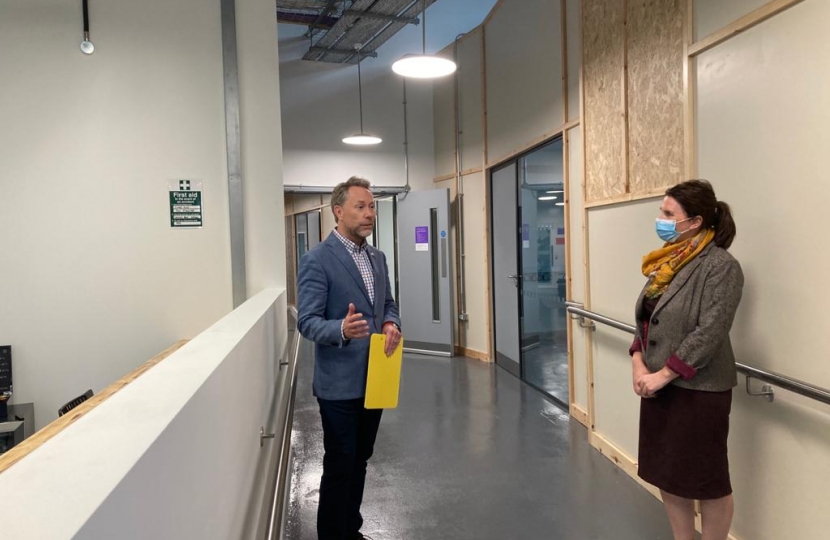 Trudy speaks with BECs Michael Pemberton during tour of newly opened bus station development 