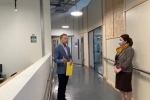 Trudy speaks with BECs Michael Pemberton during tour of newly opened bus station development 