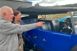 Club member Peter Johnston shows Trudy his 1929 Vauxhall 20/60 R-type